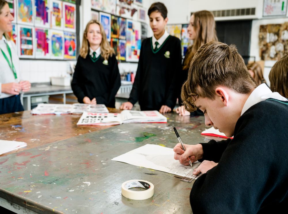 A group of school pupils at a workbench